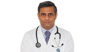 Dr. TARUN BHATNAGAR